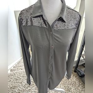 Grey blouse with sequin around the top